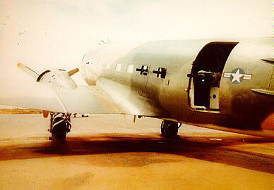 File:AC-47 gunship - one gatling gun points out the cargo door, and one each points out of the two windows forward of the door.jpg
