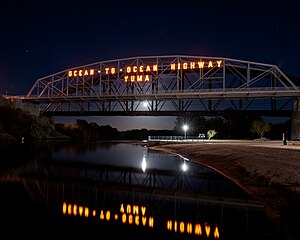 The Ocean to Ocean bridge at night over the Colorado River in Yuma, AZ. Photo by Alexander Stephens, Reclamation. (11970600535).jpg