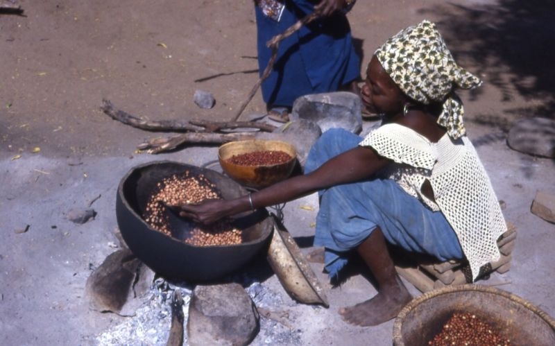 File:Senegalese woman prepares food CC-by-sa by John Atherton .jpg