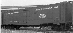 (CC) Photo: J.S. Sand / TrainWeb.com Railway Express Agency refrigerator car #6687, a converted World War II troop sleeper. Note the square panels along the sides that cover the former window openings.