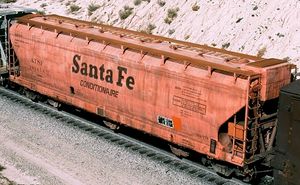 © Photo: Ron Hawkins ATSF #101438, one of a hundred specially-built "Conditionaire" centerflow hoppers operated by the Atchison, Topeka and Santa Fe Railway in the early 1970s.