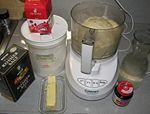 Dough in a food processor made from the ingredients shown