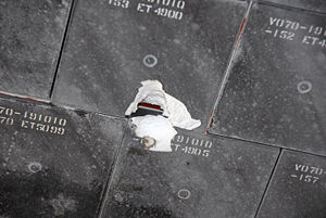 STS-118 damaged tile.jpg