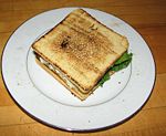 A chicken salad sandwich on toasted Pullman bread